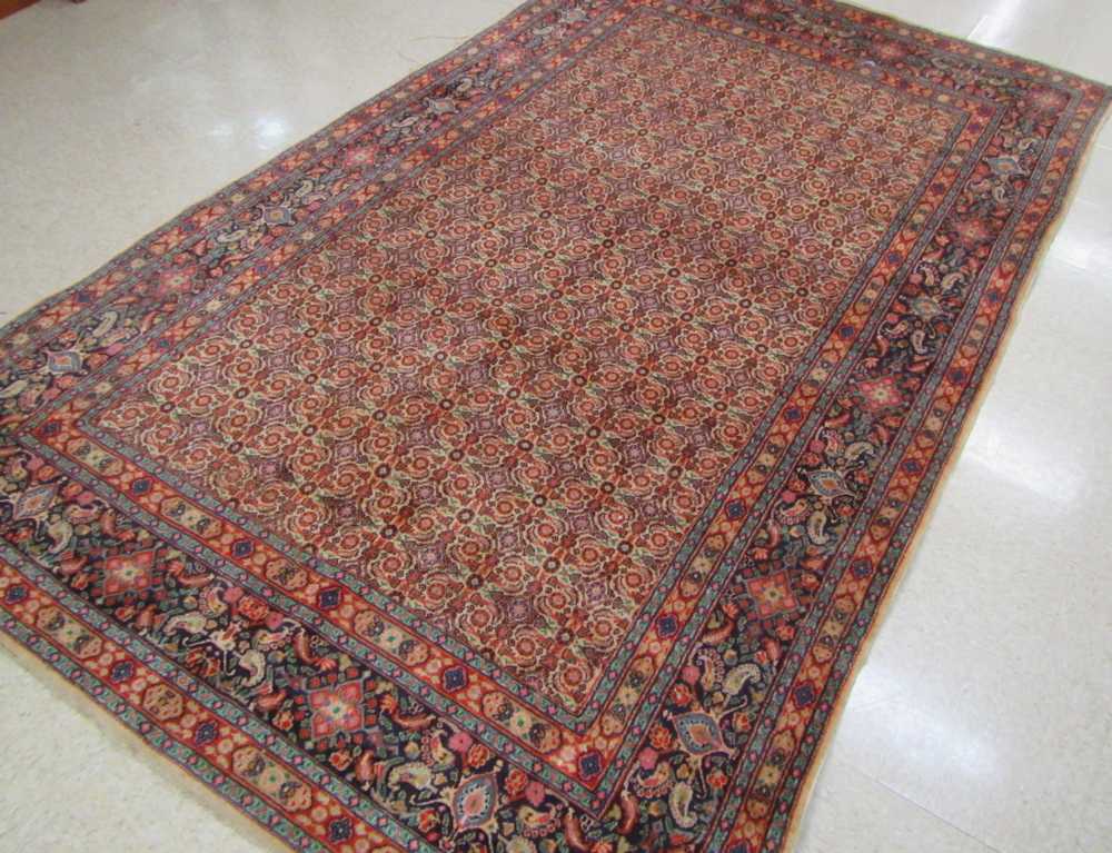 Appraisal: HAND KNOTTED PERSIAN CARPET overall repeating floral boteh pattern '