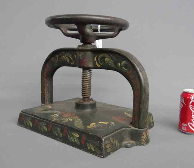 Appraisal: Early cast iron book press Paint decorated '' W ''