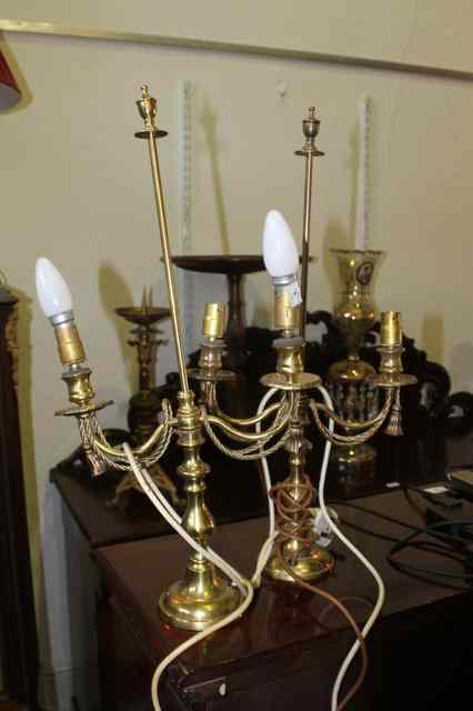 Appraisal: A PAIR OF BRASS TABLE LAMPS of two branch form