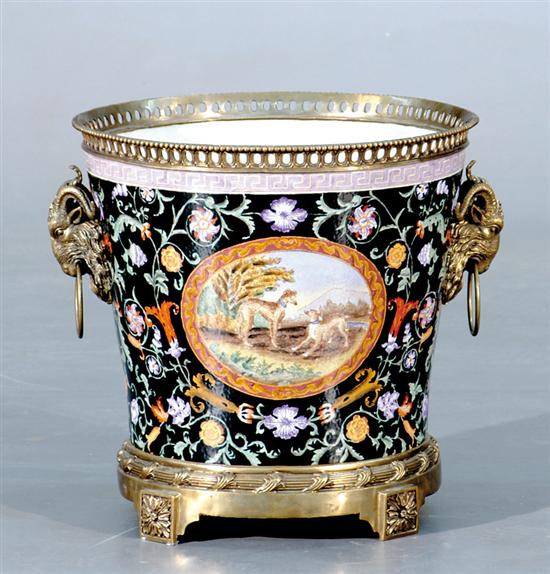 Appraisal: Continental porcelain and bronze-mounted cachepot pierced gallery over flared basin