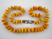 Appraisal: An amber necklace approx cm long mm wide gms