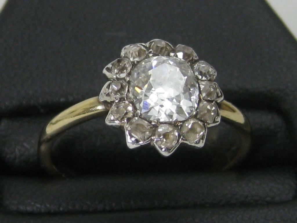 Appraisal: A Diamond cluster Ring the circular-cut central stone approx ct