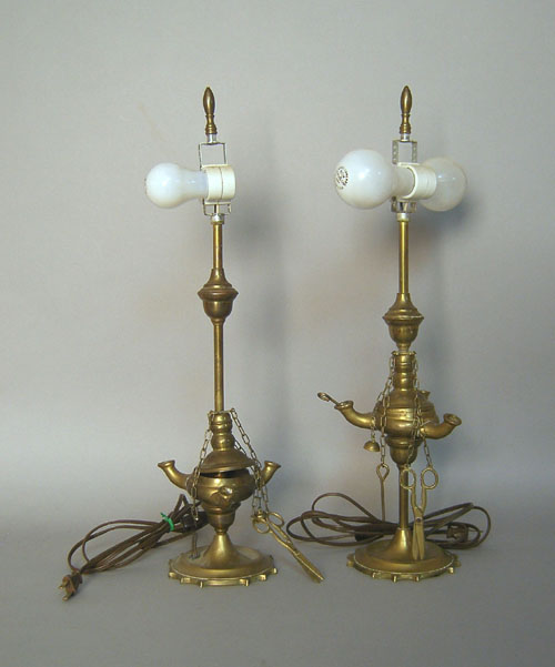 Appraisal: Pair of brass fluid lamps th c together with a