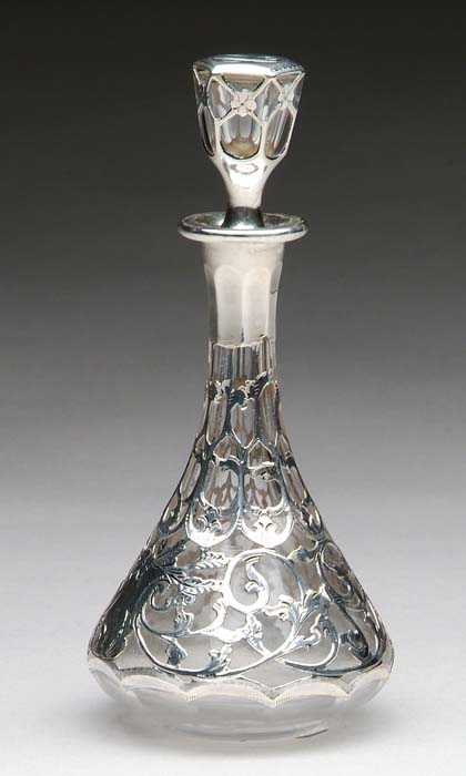 Appraisal: FINE SILVER OVERLAY CUT GLASS DRESSER BOTTLE Bottle having a