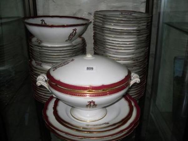 Appraisal: An extensive Limoges gilt and maroon decorated dinner service including