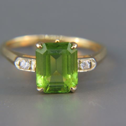 Appraisal: Peridot Diamond Ring carat emerald cut gem with small diamond