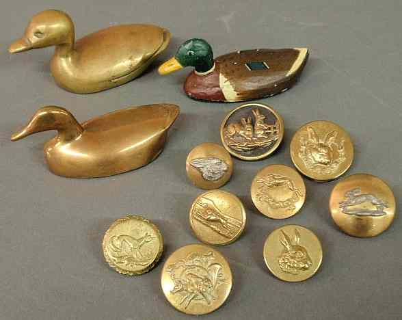 Appraisal: Nine brass buttons from foxhunting coats two brass ducks and