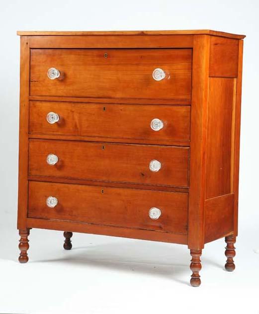 Appraisal: CHEST OF DRAWERS Cherry with paneled sides and one large