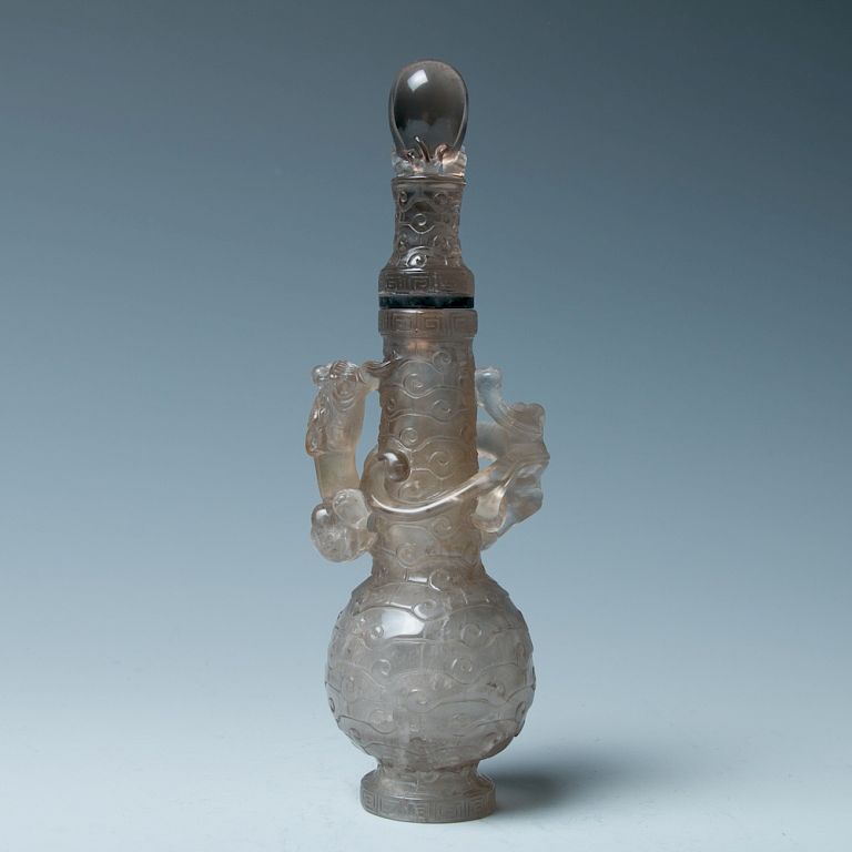 Appraisal: SMOKY QUARTZ 'DRAGON' VASE BOTTLE Of globular body rising to