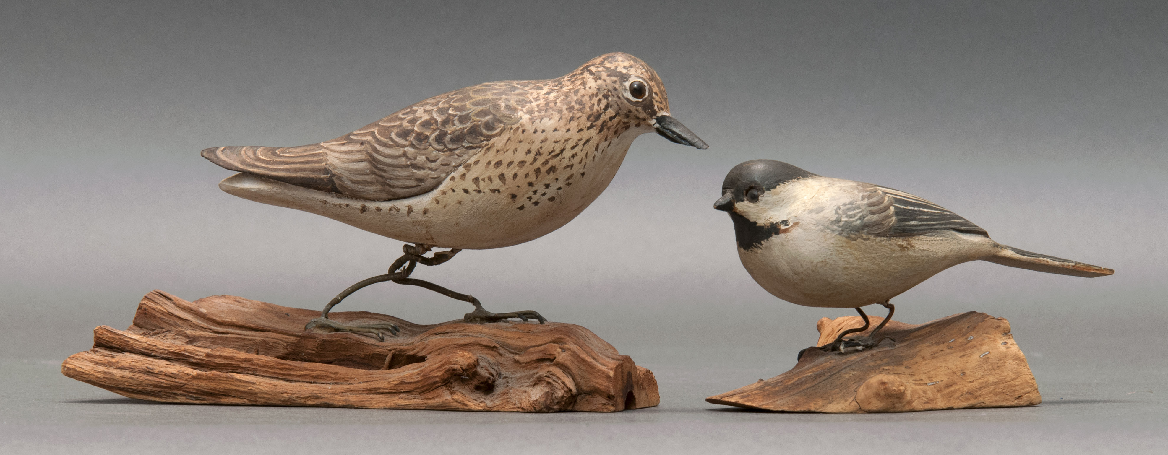 Appraisal: TWO LIFE-SIZE DECORATIVE BIRD CARVINGS th CenturyA sandpiper in running