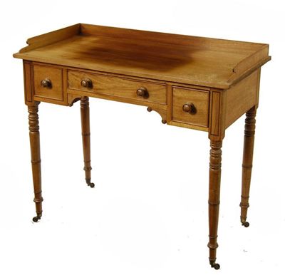 Appraisal: An early th century mahogany washstand with a gallery above