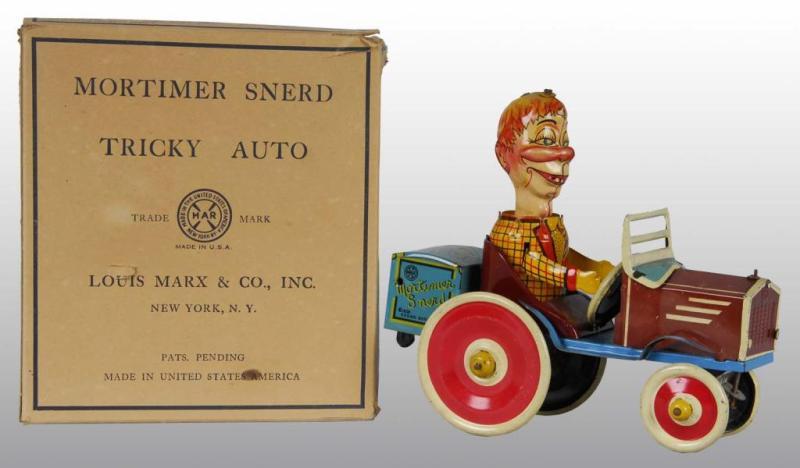 Appraisal: Tin Marx Mortimer Snerd Tricky Auto Wind-Up Toy Description American