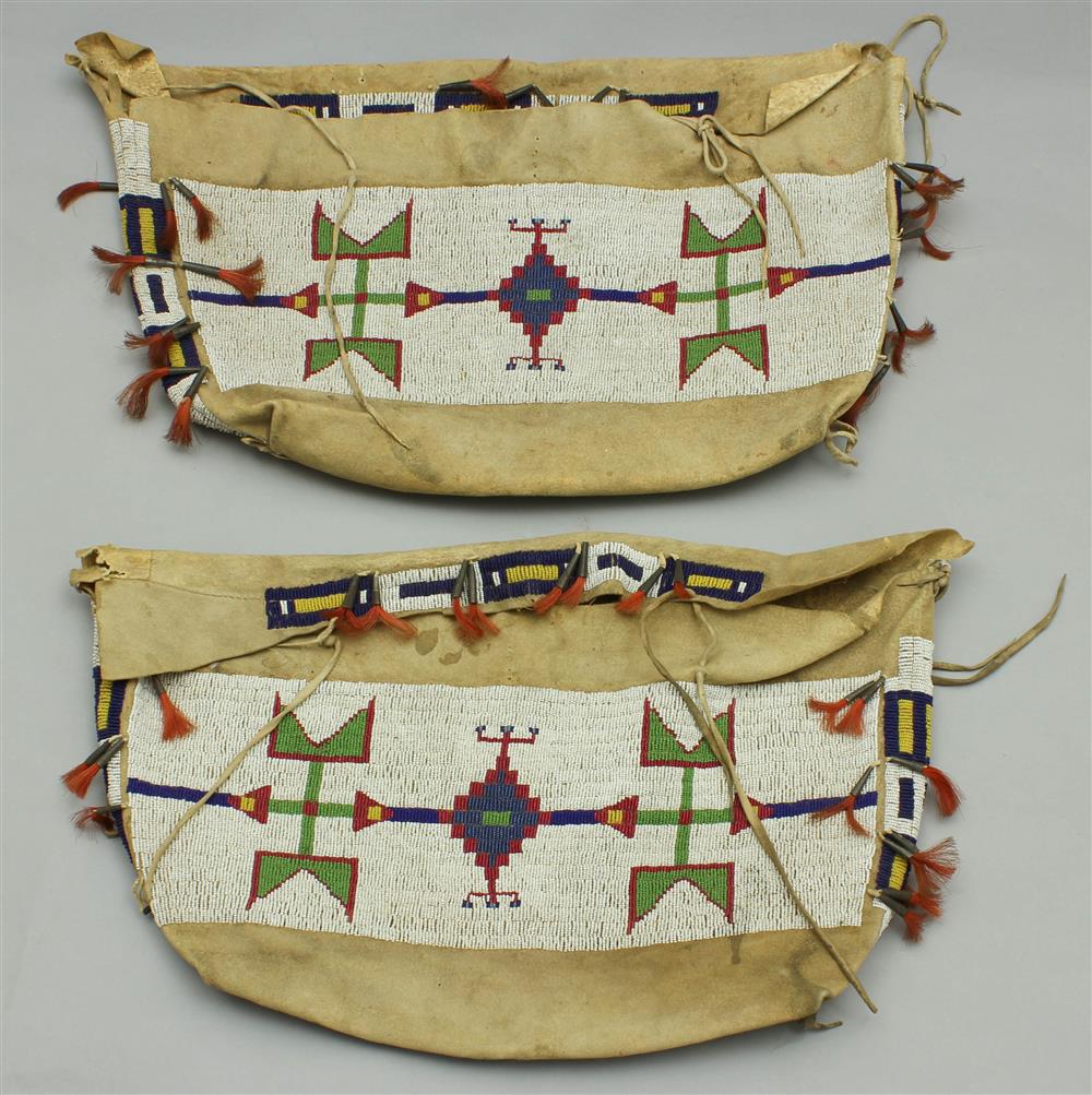 Appraisal: PAIR OF NATIVE AMERICAN BEADED HIDE POSSIBLE BAGS Central Plains