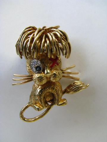 Appraisal: K yellow gold lion pin pendant with diamond and sapphire