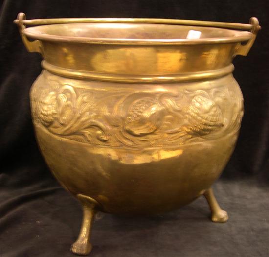 Appraisal: Urn brass swing handle footed impressed fruit motif band ''