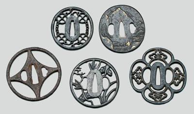 Appraisal: Five Japanese iron tsuba one with mountain village figures in