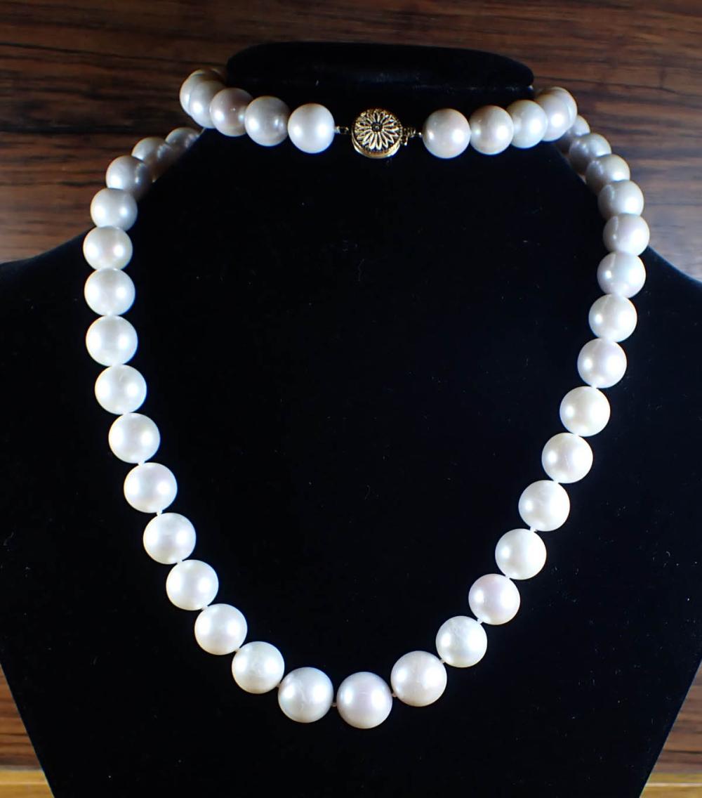 Appraisal: OPERA LENGTH PEARL AND EIGHTEEN KARAT GOLD NECKLACE hand-knotted strand