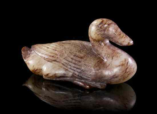 Appraisal: A Jade Carving of a Duck Ming Dynasty of white