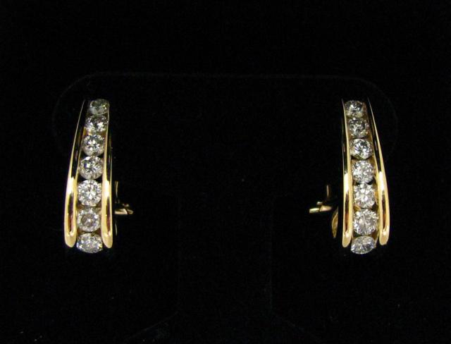 Appraisal: Pair of lady's K yellow gold J-hoop earrings diamonds in