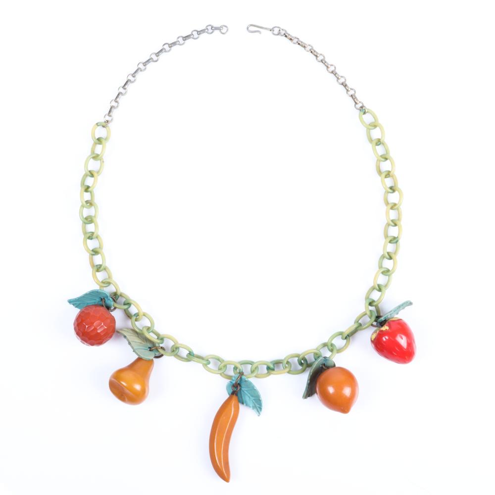 Appraisal: MIXED FRUIT MULTI-COLOR BAKELITE NECKLACE WITH CARVED GREEN CELLULOID LEAVES