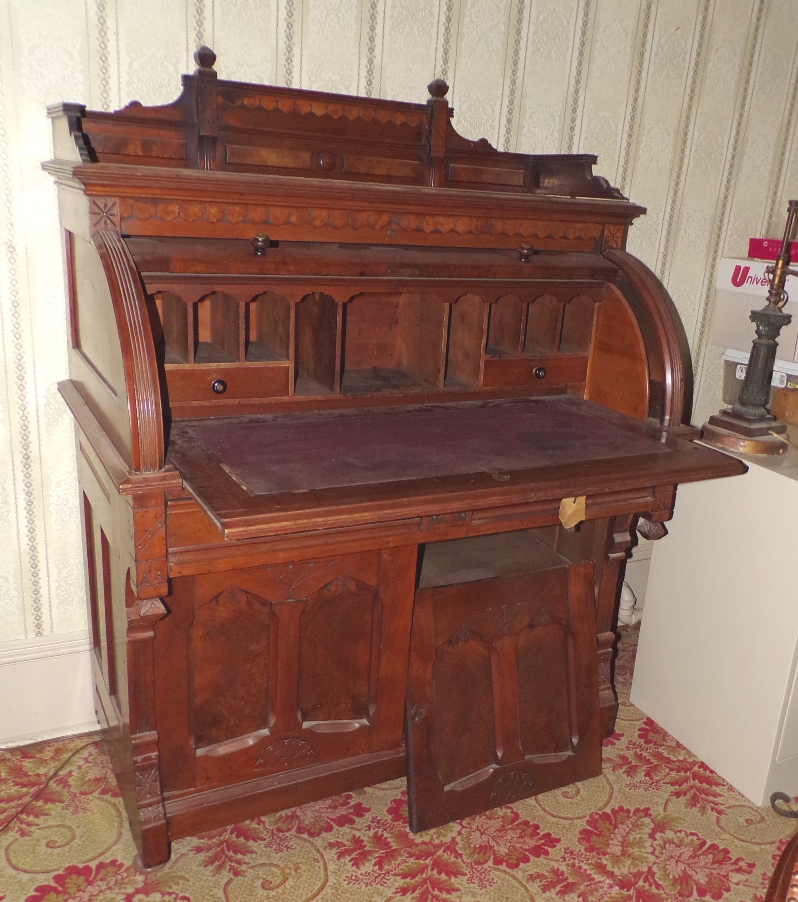 Appraisal: Victorian Eastlake walnut barrel top desk ca 's fitted interior