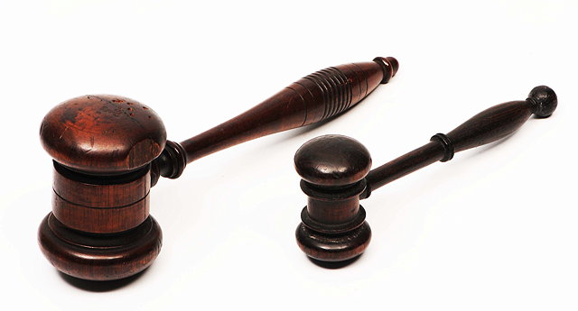 Appraisal: A TURNED WOODEN GAVEL cm long together with a smaller