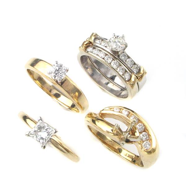 Appraisal: A collection of diamond and gold rings eleven rings set