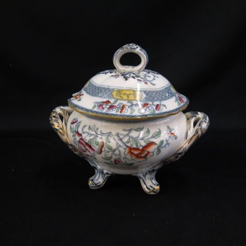 Appraisal: Victorian Ironstone Sauce Tureen footed handled colorful floral