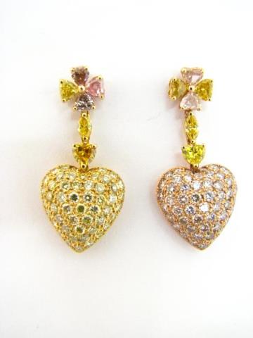 Appraisal: A pair of Le Vian heart shaped dangle earrings in