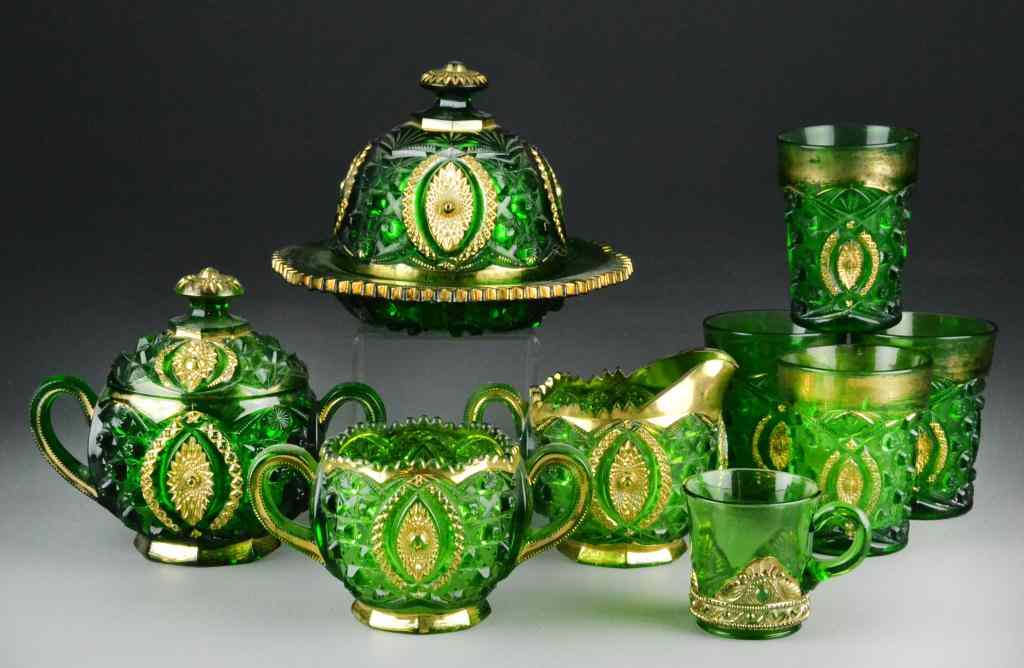 Appraisal: Piece Green Glass Breakfast SetPressed green glassware having gilt trim