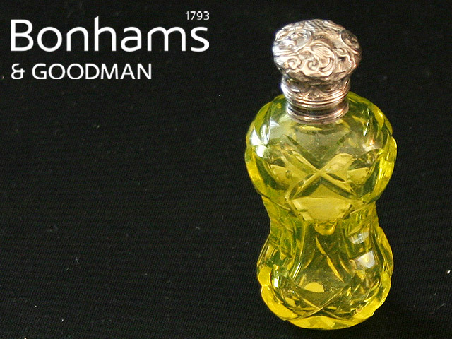 Appraisal: A Victorian silver mounted scent bottle of waisted form in