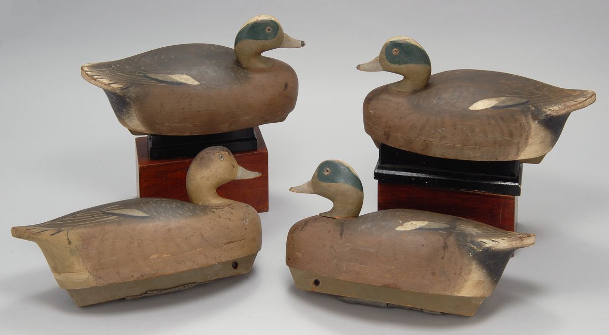 Appraisal: FOUR HOLLOW-CARVED WIDGEON DECOYS By the Wildfowler Decoy Co of