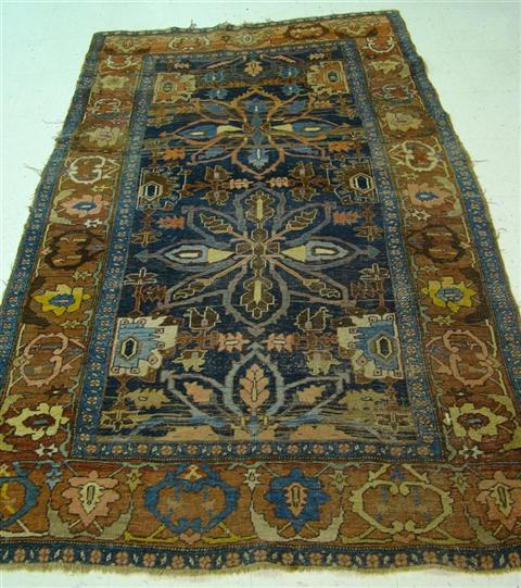 Appraisal: ORIENTAL NAVY AND BURNET ORANGE CARPET x INCHES