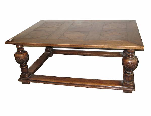 Appraisal: A Continental Baroque style walnut center table height in width