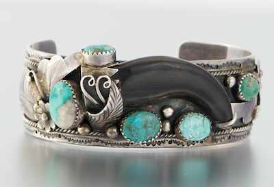 Appraisal: A Sterling Silver Turquoise and Claw Cuff Bracelet Sterling silver