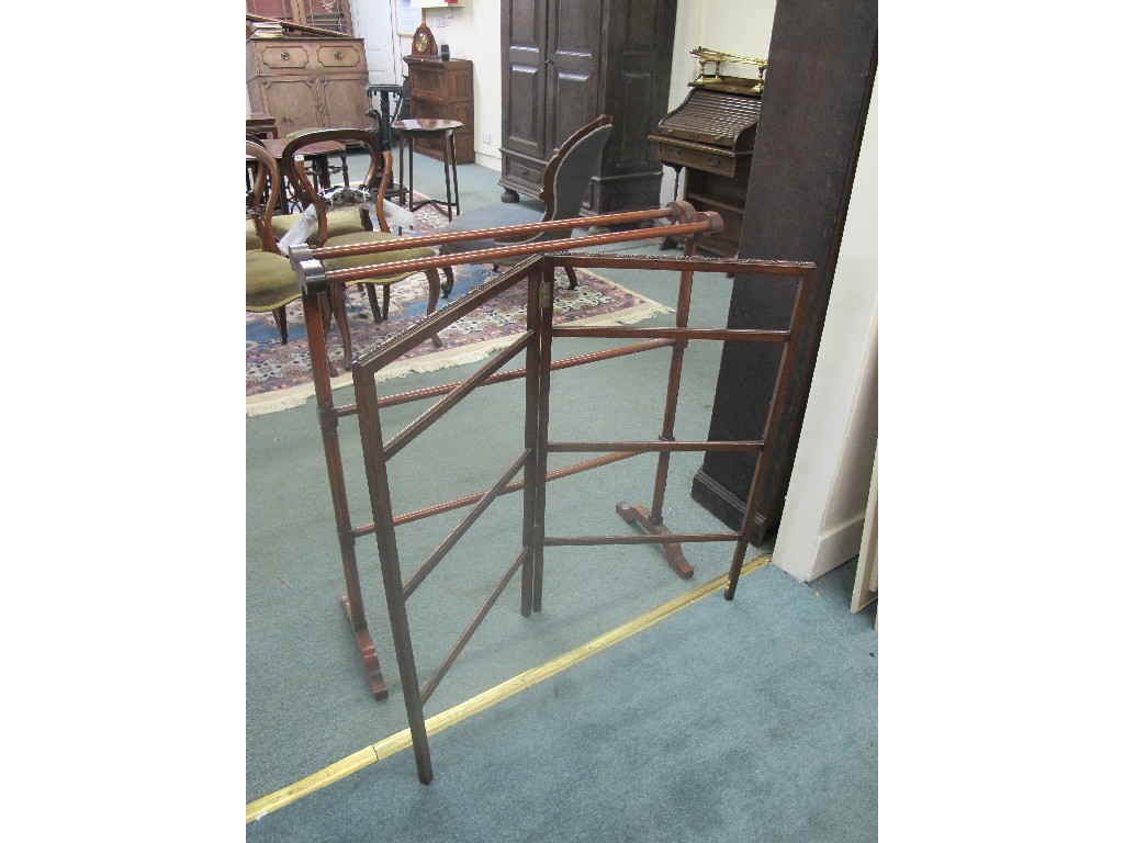 Appraisal: Two mahogany towel rails