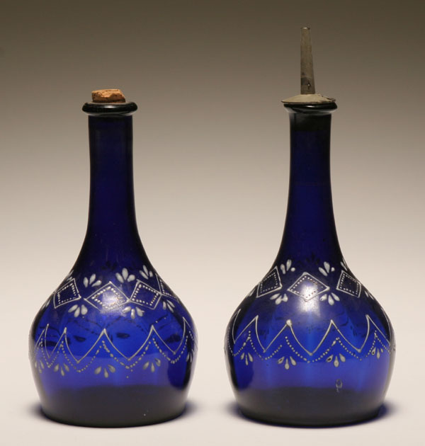 Appraisal: Pair Victorian cobalt glass barber hair tonic bottles with hand