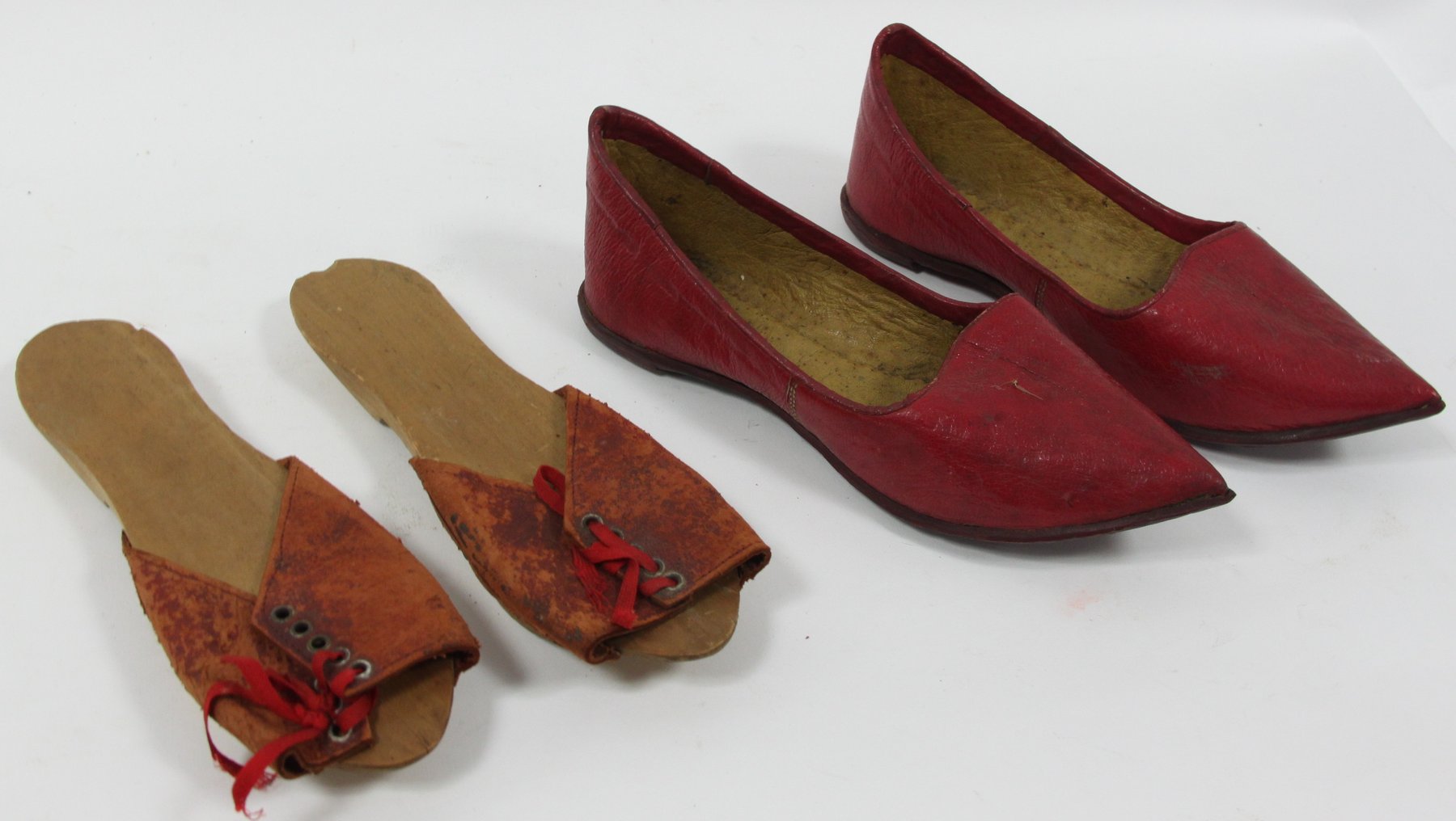 Appraisal: A pair of red leather shoes and a pair of