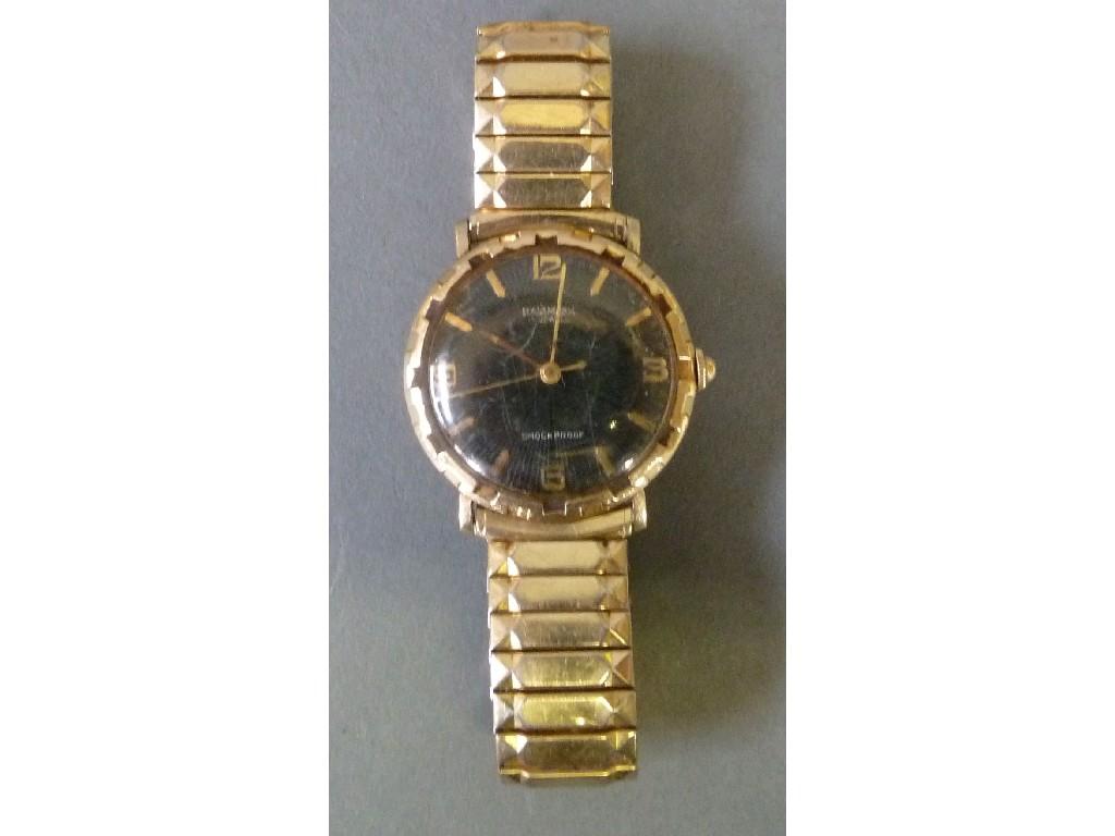 Appraisal: GENTS 'HALLMARK' ROLLED GOLD WRIST WATCH with jewel movement circular