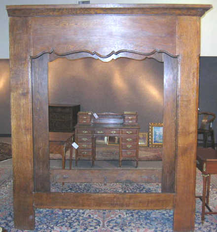 Appraisal: FRENCH TH CENTURY OAK BEDSTEAD With high canopy frame surround