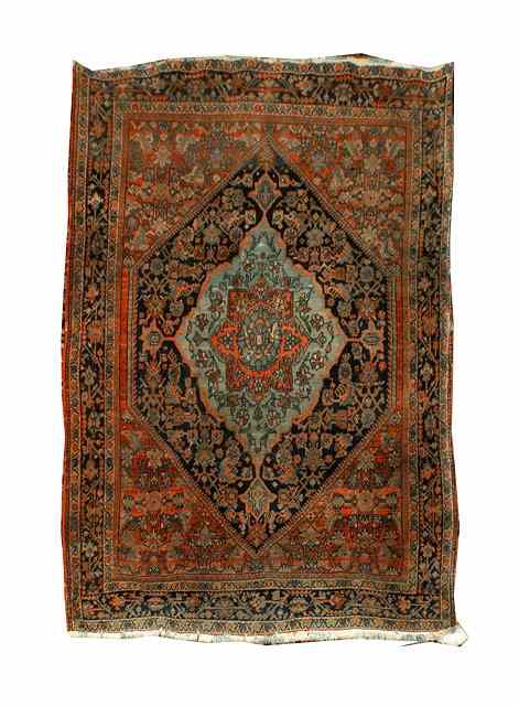 Appraisal: A HAMADAN RED GROUND RUG decorated a central blue ground