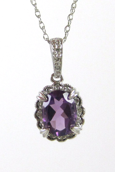 Appraisal: FOURTEEN KARAT WHITE GOLD AND AMETHYST PENDANT NECKLACE approximately ct