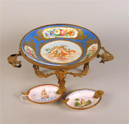 Appraisal: Sevres style porcelain plate on gilt metal stand With a