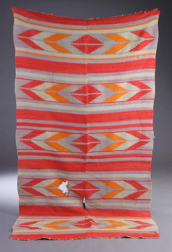 Appraisal: NAVAJO BLANKET - in x in There are several large