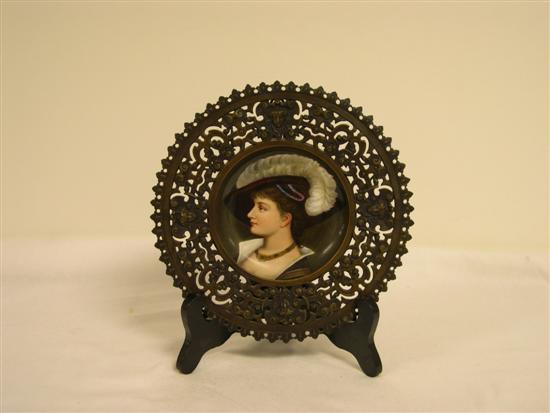 Appraisal: Porcelain dish in reticulated metal frame hand painted portrait of