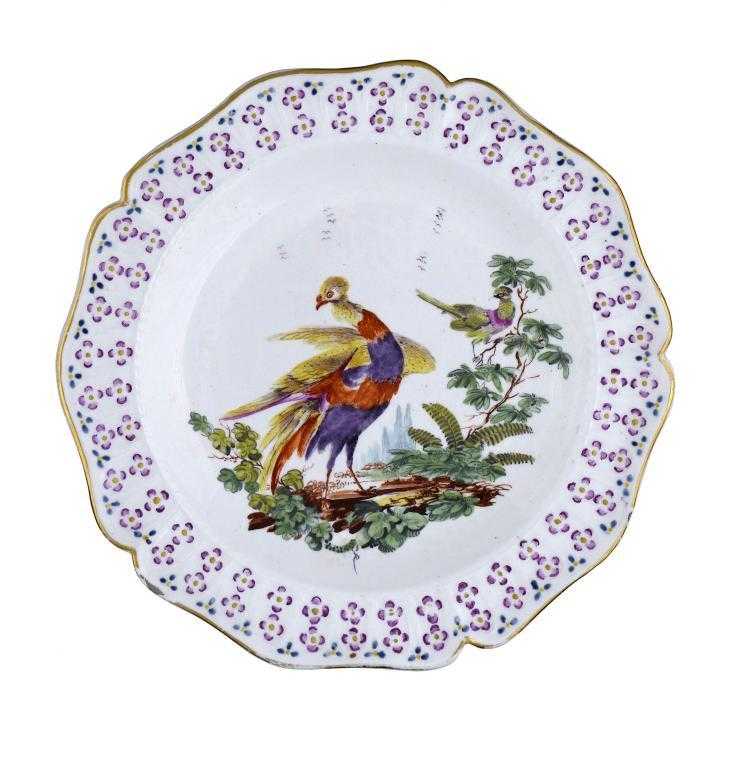 Appraisal: A DERBY PLATE boldly painted in bright enamels with a