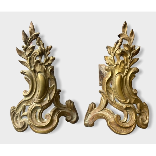 Appraisal: A pair of French Rococo Gilt bronze Chenets