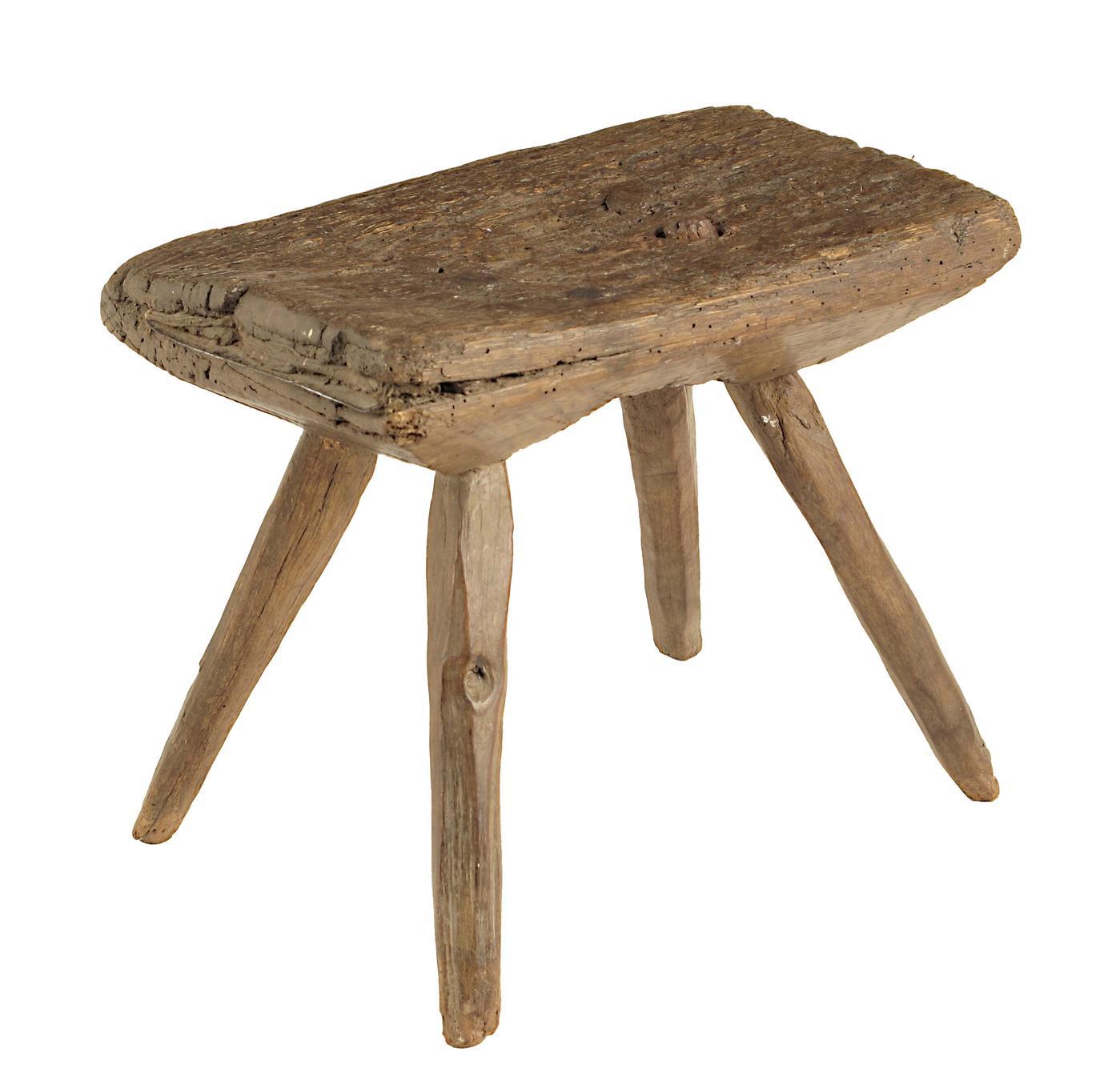 Appraisal: A French primitive chestnut stool