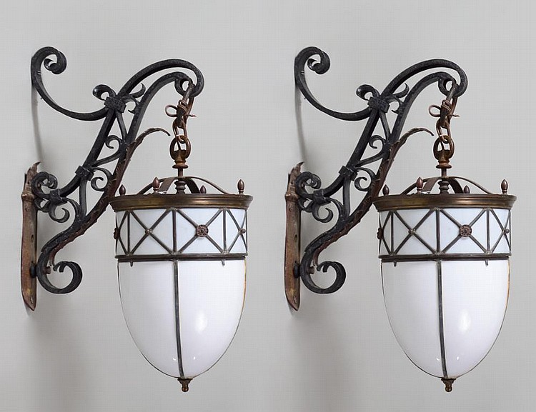 Appraisal: PAIR OF SCROLLED IRON OPALINE GLASS LIGHT FIXTURESContinental Late th