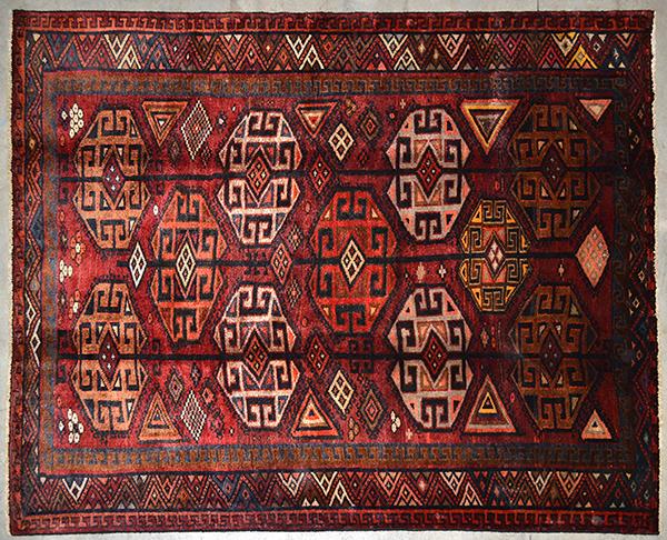 Appraisal: LURI Tribal weave and design of all-over repeating angular medallions